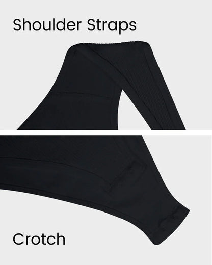 Close-up of black shapewear showing shoulder straps and crotch details on white background