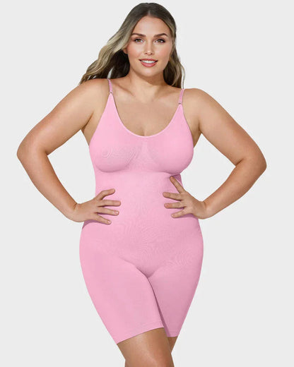 Woman wearing pink seamless shapewear bodysuit, adjustable straps, curve-enhancing fit