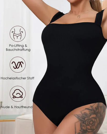 Woman wearing black shapewear bodysuit, high elasticity, tummy control, visible tattoo