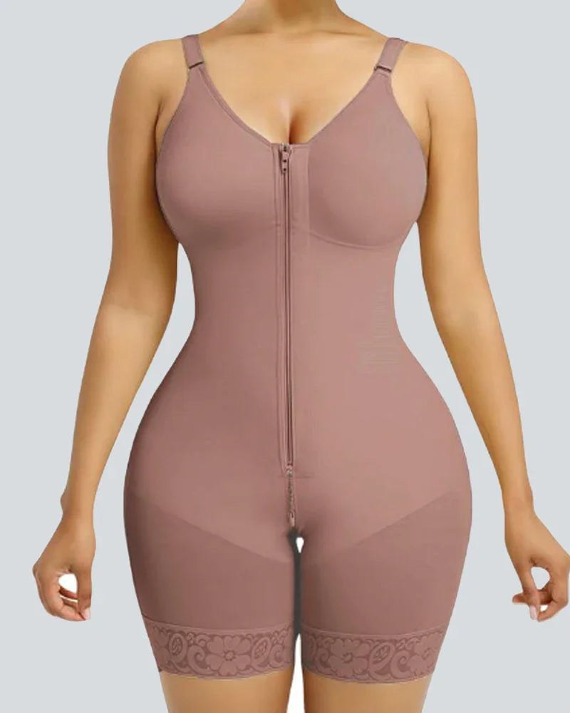 Beige full-body shapewear with zipper front, adjustable straps and lace-trimmed shorts