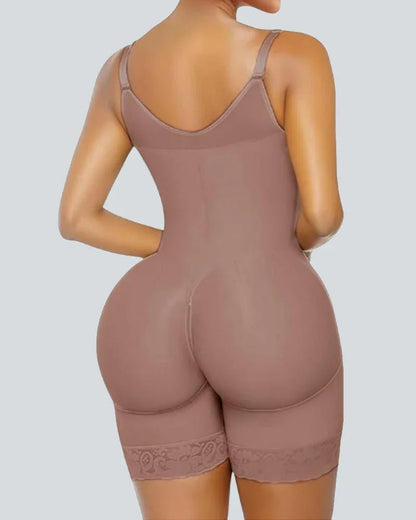Woman wearing seamless nude shapewear bodysuit with lace trim, viewed from the back