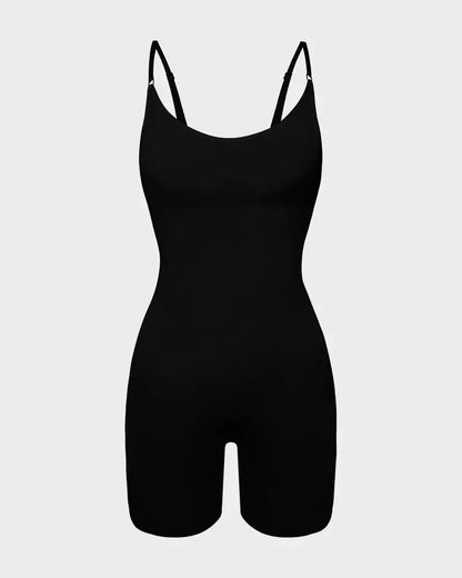 Black shapewear bodysuit with adjustable straps and mid-thigh length, front view