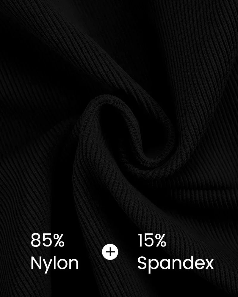 Close-up of black ribbed fabric with 85% nylon and 15% spandex composition.