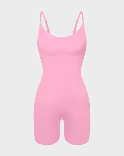 Seamless pink shapewear bodysuit with adjustable straps, designed for body shaping